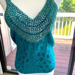 BCBG wool top with beading detail at neckline and a soft animal print. Size xs